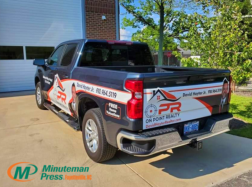 On Point Reality Custom Truck Graphic by Minuteman Press in Fayetteville, NC